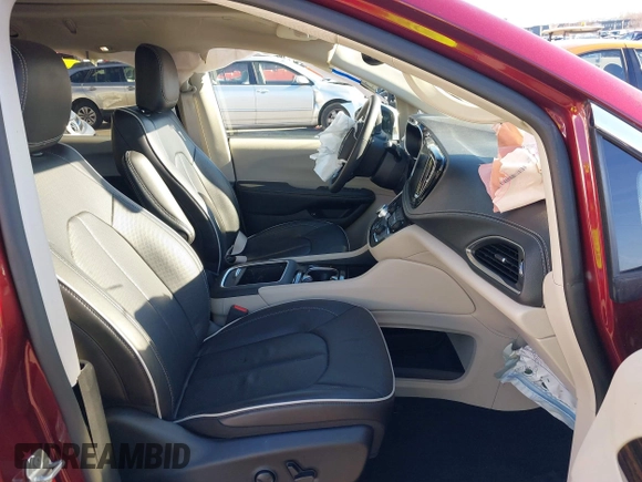 2023 Chrysler Pacifica Hybrid Limited with VIN 2C4RC1S7XPR518695, listed as a IAAI auction lot 41301401 with 24,433 mi miles and . Bid and sale history available at DreamBid. Image 5.