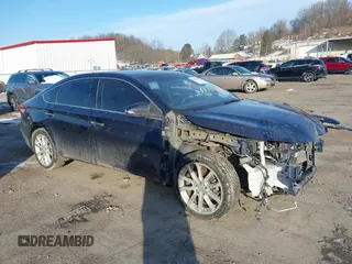 2014 Toyota Avalon Limited with VIN 4T1BK1EB9EU090599, listed as a IAAI auction lot 41585396 with 81,315 mi miles and . Bid and sale history available at DreamBid. Image 1.