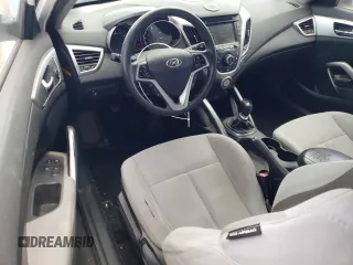 2013 Hyundai Veloster w/Black Int z VIN KMHTC6AD3DU085015, wystawiony jako Copart lot #54473595 z przebiegiem 158 966 mil mil oraz Szkoda całkowita • Salvage title. Historia ofert i sprzedaży dostępna na DreamBid. Obrazek 8.