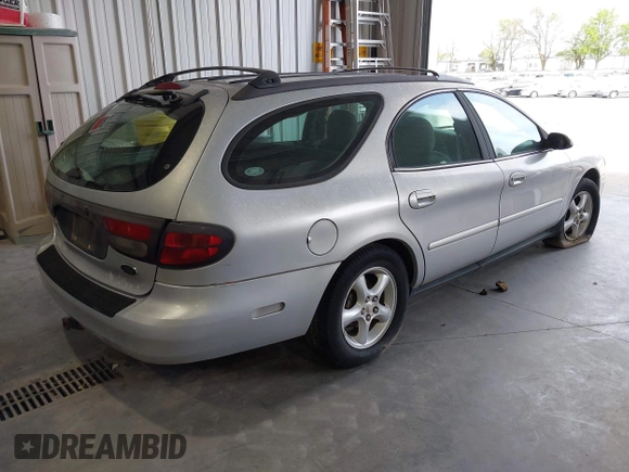 2001 Ford Taurus SE Standard with VIN 1FAFP58U91G202523, listed as a IAAI auction lot 42092190 with 197,961 mi miles. Bid and sale history available at carsss.com. Image 4.