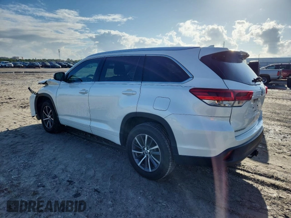 2017 Toyota Highlander XLE with VIN 5TDKZRFHXHS520571, listed as a Copart auction lot 64376585 with 116,027 mi miles and Salvage title. Bid and sale history available at DreamBid. Image 2.