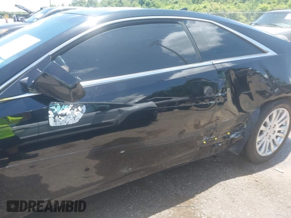 2012 Cadillac CTS Performance z VIN 1G6DJ1E31C0139231, wystawiony jako IAAI lot #42446853 z przebiegiem 102 857 mil mil oraz . Historia ofert i sprzedaży dostępna na DreamBid. Obrazek 6.