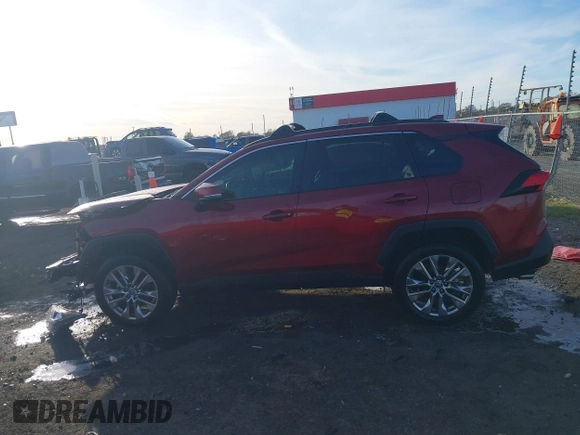 2021 Toyota RAV4 XLE Premium with VIN 2T3C1RFV1MW145048, listed as a IAAI auction lot 41018272 with 61,959 mi miles and . Bid and sale history available at DreamBid. Image 14.