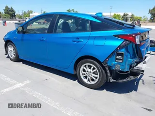 2022 Toyota Prius L Eco with VIN JTDKAMFU1N3164838, listed as a IAAI auction lot 42234309 with 45,451 mi miles and . Bid and sale history available at DreamBid. Image 3.