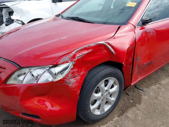 2007 Toyota Camry CE with VIN 4T1BE46K77U109046, listed as a IAAI auction lot 41870289 with 129,027 mi miles. Bid and sale history available at carsss.com. Image 6.