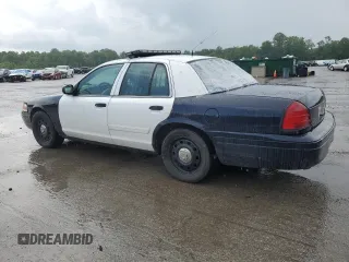 2011 Ford Police Interceptor with VIN 2FABP7BV8BX160188, listed as a Copart auction lot 59710915 with 142,316 mi miles and Salvage title. Bid and sale history available at DreamBid. Image 2.