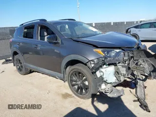 2018 Toyota RAV4 XLE with VIN 2T3WFREV0JW451962, listed as a IAAI auction lot 41670185 with 75,718 mi miles. Bid and sale history available at carsss.com. Image 1.