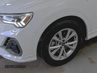 2023 Audi Q3 S line Premium with VIN WA1DECF37P1107583, listed as a IAAI auction lot 42708277 with 51,891 mi miles and . Bid and sale history available at DreamBid. Image 24.