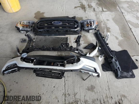 2023 Ford F-150 XL with VIN 1FTEW1CP9PKD19429, listed as a Copart auction lot 58021125 with 13,678 mi miles and Salvage title. Bid and sale history available at DreamBid. Image 12.