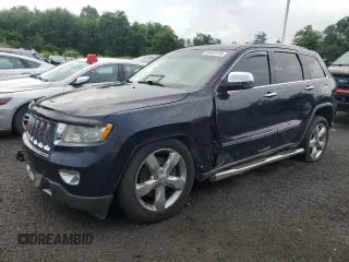 2011 Jeep Grand Cherokee Overland with VIN 1J4RR6GT5BC561063, listed as a Copart auction lot 64432475 with 151,940 mi miles and Clean title. Bid and sale history available at DreamBid. Image 1.
