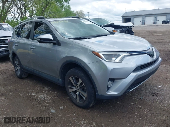 2018 Toyota RAV4 XLE z VIN 2T3WFREV1JW427878, wystawiony jako IAAI lot #42191031 z przebiegiem 97 264 mil mil oraz . Historia ofert i sprzedaży dostępna na DreamBid. Obrazek 1.
