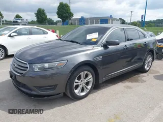 2015 Ford Taurus SEL with VIN 1FAHP2E83FG175051, listed as a IAAI auction lot 42357517 with 200,033 mi miles and . Bid and sale history available at DreamBid. Image 2.