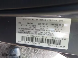 2014 Mazda Mazda6 i Sport with VIN JM1GJ1U66E1133816, listed as a IAAI auction lot 41872811 with 97,035 mi miles. Bid and sale history available at carsss.com. Image 9.