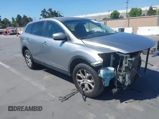 2011 Mazda CX-9 Sport z VIN JM3TB2BVXB0307360, wystawiony jako IAAI lot #42580629 z przebiegiem 136 928 mil mil oraz . Historia ofert i sprzedaży dostępna na DreamBid. Obrazek 1.