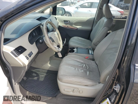 2011 Toyota Sienna XLE AAS with VIN 5TDYK3DC8BS019513, listed as a Copart auction lot 54671575 with 149,633 mi miles and Salvage Title. Bid and sale history available at DreamBid. Image 7.