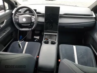 2023 Fisker Ocean One z VIN VCF1ZBU23PG005129, wystawiony jako Copart lot #56694065 z przebiegiem 169 mil mil oraz Tytuł czysty. Historia ofert i sprzedaży dostępna na DreamBid. Obrazek 8.