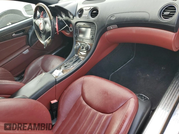 2011 Mercedes-Benz SL 550 z VIN WDBSK7BA4BF163119, wystawiony jako Copart lot #81606644 z przebiegiem 195 074 mil mil oraz Czysty tytuł • Clean title. Historia ofert i sprzedaży dostępna na DreamBid. Obrazek 8.