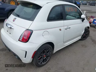 2015 FIAT 500 Abarth with VIN 3C3CFFFH1FT597459, listed as a IAAI auction lot 42085138 with 71,479 mi miles. Bid and sale history available at carsss.com. Image 4.