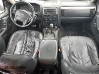 2004 Jeep Grand Cherokee Laredo с VIN 1J4GW48S94C258963, выставлен на аукционе Copart как лот 57390035 с пробегом 179 385 миль миль и Списание • Salvage title. История ставок и продаж доступна на DreamBid. Изображение 8.