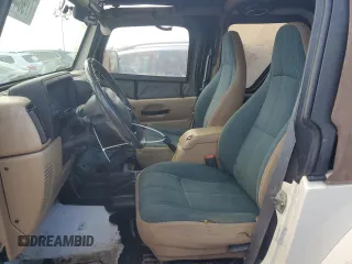 2001 Jeep Wrangler Sahara with VIN 1J4FA59S31P334308, listed as a Copart auction lot 77984464 with 116,293 mi miles and Salvage Title. Bid and sale history available at carsss.com. Image 7.
