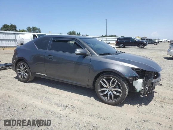 2015 Scion tC z VIN JTKJF5C76FJ010813, wystawiony jako Copart lot #58987575 z przebiegiem 108 709 mil mil oraz Szkoda całkowita • Salvage title. Historia ofert i sprzedaży dostępna na DreamBid. Obrazek 4.