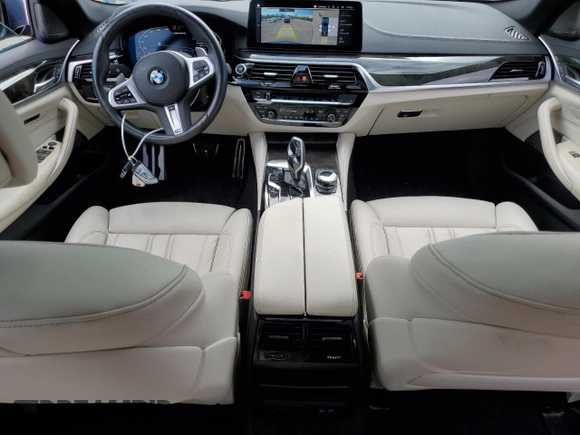 2023 BMW 5 Series M550i xDrive with VIN WBA13BK06PCM31937, listed as a Copart auction lot 66490494 with 24,972 mi miles and Salvage title. Bid and sale history available at DreamBid. Image 8.