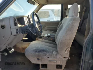 1996 GMC Sierra 1500 with VIN 2GTEC19W2T1531333, listed as a Copart auction lot 87290734 with 380,150 mi miles and Clean Title. Bid and sale history available at DreamBid. Image 7.
