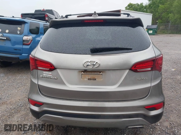 2017 Hyundai Santa Fe 2.4L z VIN 5XYZU3LB8HG421397, wystawiony jako IAAI lot #41961915 z przebiegiem 102 594 mil mil oraz . Historia ofert i sprzedaży dostępna na DreamBid. Obrazek 16.