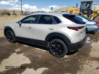 2022 Mazda CX-30 2.5 Turbo with VIN 3MVDMBAY1NM447753, listed as a Copart auction lot 68148334 with 5,180 mi miles and Salvage Title. Bid and sale history available at DreamBid. Image 2.