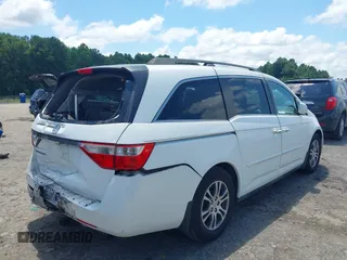2011 Honda Odyssey EX-L with VIN 5FNRL5H6XBB002461, listed as a IAAI auction lot 42662720 with 145,672 mi miles and . Bid and sale history available at DreamBid. Image 4.