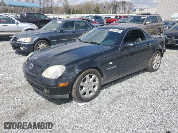 1999 Mercedes-Benz SLK-Class with VIN WDBKK47F2XF102927, listed as a Copart auction lot 50265585 with 184,918 mi miles and Salvage Title. Bid and sale history available at carsss.com. Image 1.