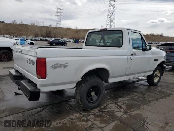 1996 Ford F-150 with VIN 1FTEF14Y2TLA02667, listed as a Copart auction lot 49686735 with 143,197 mi miles and Clean title. Bid and sale history available at DreamBid. Image 3.