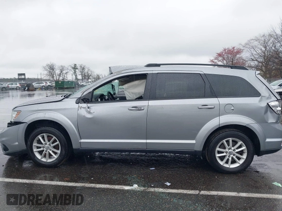 2016 Dodge Journey SXT with VIN 3C4PDDBG7GT173158, listed as a IAAI auction lot 42020182 with 159,136 mi miles. Bid and sale history available at carsss.com. Image 14.