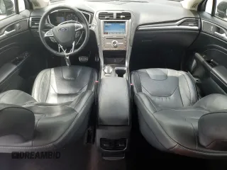 2017 Ford Fusion Titanium z VIN 3FA6P0K92HR192881, wystawiony jako Copart lot #61190515 z przebiegiem 109 834 mil mil oraz Szkoda całkowita • Salvage title. Historia ofert i sprzedaży dostępna na DreamBid. Obrazek 8.