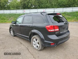 2012 Dodge Journey SXT with VIN 3C4PDDBG5CT226207, listed as a Copart auction lot 57668305 with 201,404 mi miles and Clean title. Bid and sale history available at DreamBid. Image 2.