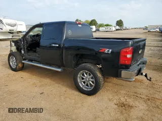 2011 Chevrolet Silverado 1500 LT with VIN 3GCPKSE34BG329015, listed as a Copart auction lot 50697355 with 248,524 mi miles and Salvage Title. Bid and sale history available at DreamBid. Image 2.