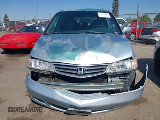 2003 Honda Odyssey EX-L with VIN 5FNRL18973B148675, listed as a IAAI auction lot 41992952 with 232,013 mi miles and . Bid and sale history available at DreamBid. Image 12.