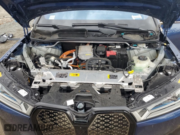 2023 BMW iX xDrive50 z VIN WB523CF0XPCL15501, wystawiony jako Copart lot #46117065 z przebiegiem 14 695 mil mil oraz Szkoda całkowita • Salvage title. Historia ofert i sprzedaży dostępna na DreamBid. Obrazek 12.