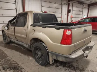 2003 Ford Explorer Sport Trac XLS with VIN 1FMZU77E63UB49429, listed as a IAAI auction lot 41396057 with 210,103 mi miles. Bid and sale history available at carsss.com. Image 3.