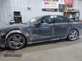2016 Audi A6 Premium Plus z VIN WAUGFAFCXGN104249, wystawiony jako IAAI lot #41631393 z przebiegiem 117 516 mil mil oraz . Historia ofert i sprzedaży dostępna na DreamBid. Obrazek 14.
