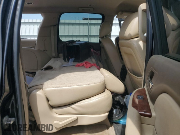 2012 Chevrolet Suburban LT with VIN 1GNSKJE77CR298049, listed as a Copart auction lot 61171865 with 247,737 mi miles and Salvage title. Bid and sale history available at DreamBid. Image 11.