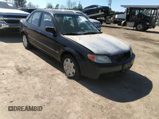 2002 Mazda Protege DX with VIN JM1BJ225420587199, listed as a IAAI auction lot 41827709 with 179,786 mi miles and . Bid and sale history available at DreamBid. Image 1.