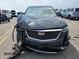 2023 Cadillac XT6 AWD Premium Luxury z VIN 1GYKPFRS7PZ225950, wystawiony jako Copart lot #65573174 z przebiegiem Nie podano mil oraz Szkoda całkowita • Salvage title. Historia ofert i sprzedaży dostępna na DreamBid. Obrazek 5.