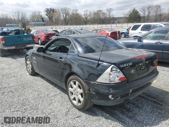1999 Mercedes-Benz SLK-Class with VIN WDBKK47F2XF102927, listed as a Copart auction lot 50265585 with 184,918 mi miles and Salvage Title. Bid and sale history available at carsss.com. Image 2.