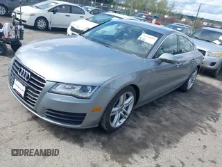 2014 Audi A7 Premium Plus z VIN WAUWGAFC4EN160144, wystawiony jako IAAI lot #41970181 z przebiegiem 118 761 mil mil oraz . Historia ofert i sprzedaży dostępna na DreamBid. Obrazek 17.