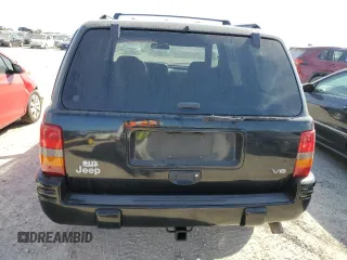 1998 Jeep Grand Cherokee Laredo with VIN 1J4GZ48Y7WC321234, listed as a Copart auction lot 75438624 with 0 mi miles and Salvage Title. Bid and sale history available at carsss.com. Image 6.