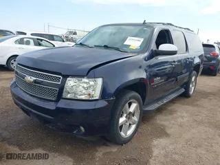 2009 Chevrolet Suburban LT w/2LT with VIN 1GNFC26JX9R280829, listed as a IAAI auction lot 41551580 with 214,351 mi miles. Bid and sale history available at carsss.com. Image 17.