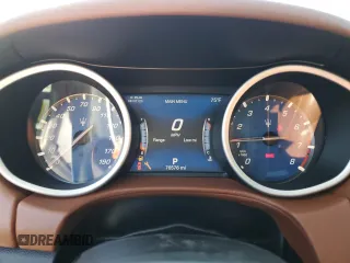 2018 Maserati Ghibli with VIN ZAM57XSA4J1268685, listed as a Copart auction lot 62302313 with 76,576 mi miles. Bid and sale history available at carsss.com. Image 9.