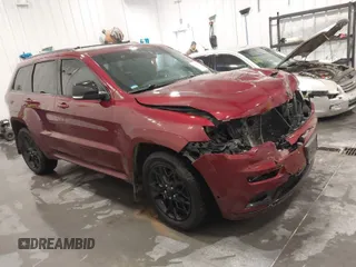 2021 Jeep Grand Cherokee 80th Anniversary with VIN 1C4RJFBG0MC759589, listed as a IAAI auction lot 41472293 with 69,103 mi miles and . Bid and sale history available at DreamBid. Image 1.