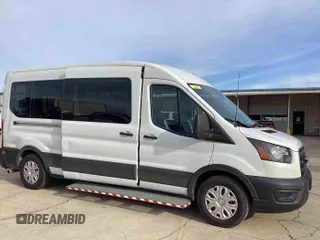 2020 Ford Transit Passenger XL z VIN 1FDAX2C86LKA63962, wystawiony jako IAAI lot #42674555 z przebiegiem 27 261 mil mil oraz . Historia ofert i sprzedaży dostępna na DreamBid. Obrazek 5.